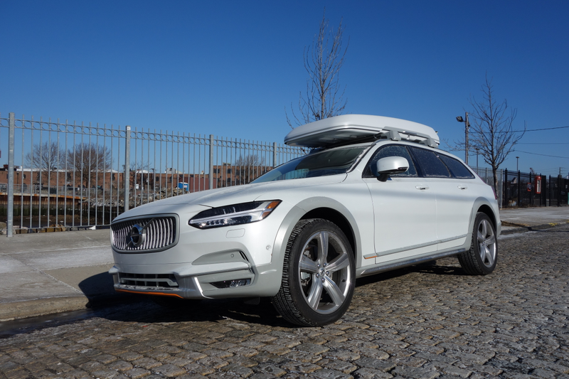 Illustration for article titled The Volvo V90 Cross Country Has Orange Seatbelts and a $3,300 Cargo Box and I Love It